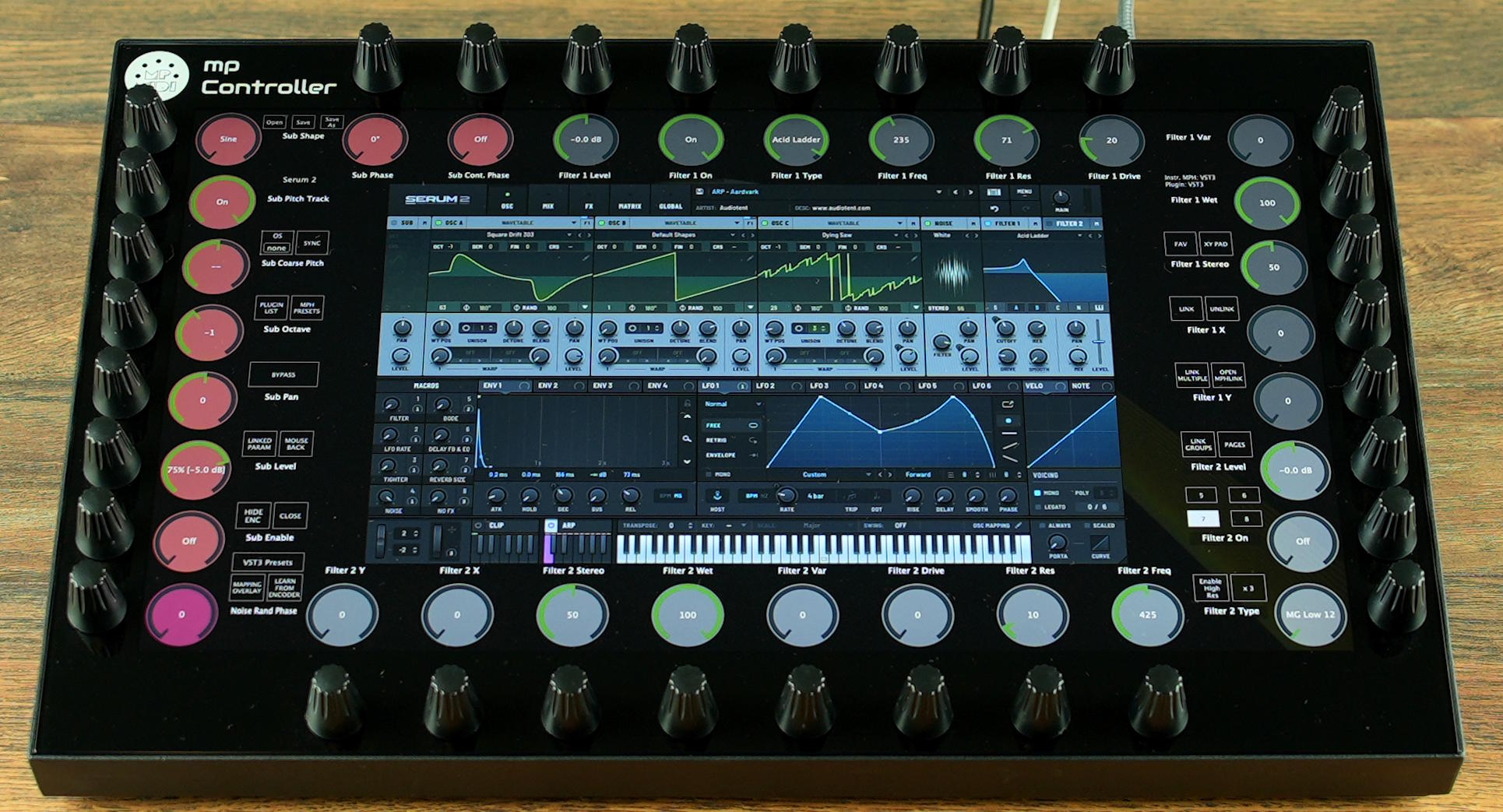 Xfer Serum 2 running on the MP Controller's 15.6-inch touchscreen, surrounded by 32 endless encoders